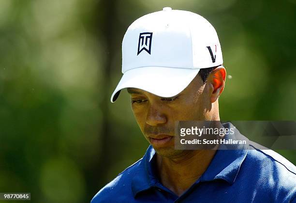 Tiger Woods walks off the 12th tee during the second round of the 2010 Quail Hollow Championship at the Quail Hollow Club on April 30, 2010 in...