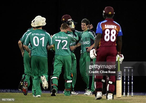 George Dockrell of Ireland celebrates the wicket of Narsingh Deonarine of West Indies during the ICC T20 World Cup Group D match between West Indies...