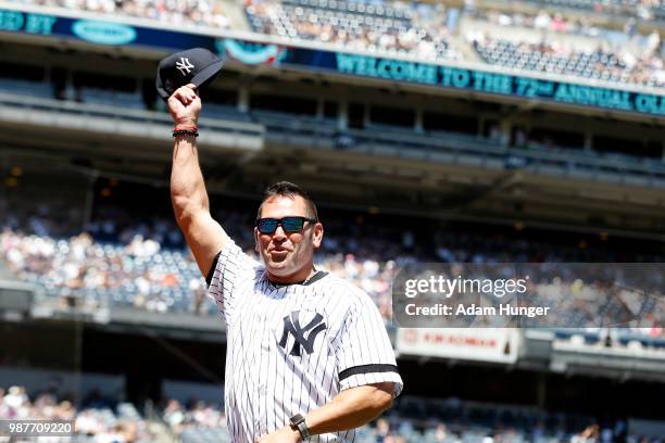 Former player Johnny Damon of the New York Yankees is introduced during the New York Yankees 72nd Old Timers Day game before the Yankees play against...