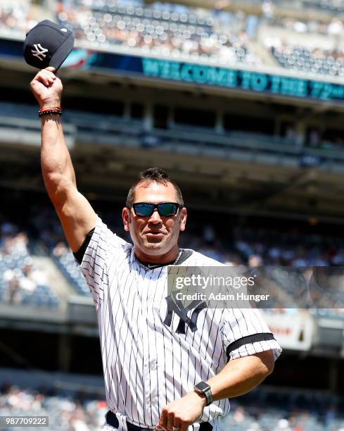 Former player Johnny Damon of the New York Yankees is introduced during the New York Yankees 72nd Old Timers Day game before the Yankees play against...