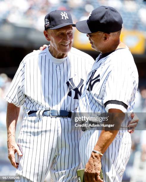 Former players Dr. Bobby Brown and Reggie Jackson of the New York Yankees take a selfie during the New York Yankees 72nd Old Timers Day game before...