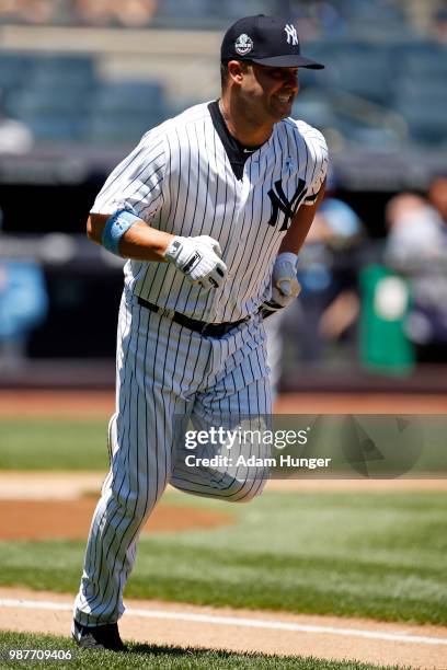 Former player Nick Swisher of the New York Yankees in action during the New York Yankees 72nd Old Timers Day game before the Yankees play against the...