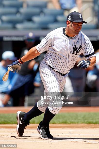 Former player Johnny Damon of the New York Yankees in action during the New York Yankees 72nd Old Timers Day game before the Yankees play against the...