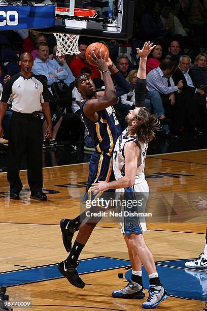 Roy Hibbert of the Indiana Pacers jumps to the basket for a the layup against Fabricio Oberto of the Washington Wizards during the game at the...