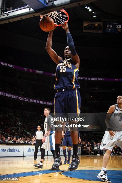 Roy Hibbert of the Indiana Pacers follows through on his slam dunk against the Washington Wizards during the game at the Verizon Center on April 14,...