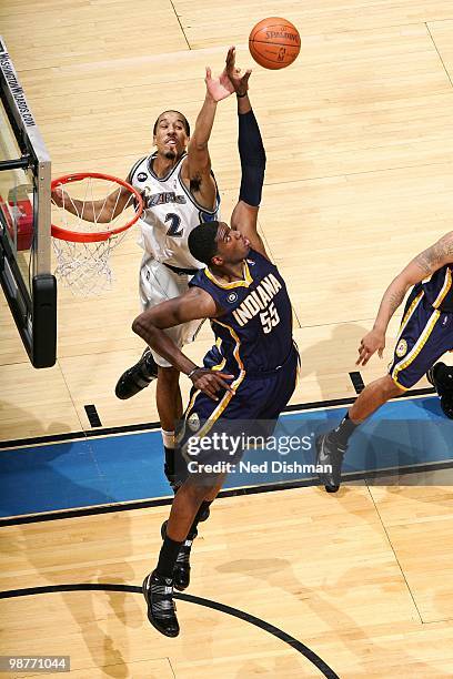 Roy Hibbert of the Indiana Pacers rebounds the loose ball against Shaun Livingston of the Washington Wizards during the game at the Verizon Center on...