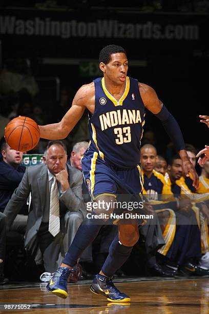 Danny Granger of the Indiana Pacers dribbles the ball against the Washington Wizards during the game at the Verizon Center on April 14, 2010 in...