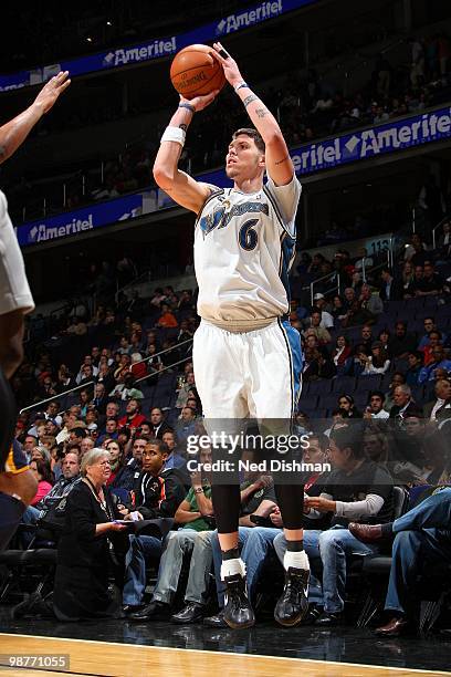 Mike Miller of the Washington Wizards shoots the outside jump shot against the Indiana Pacers during the game at the Verizon Center on April 14, 2010...