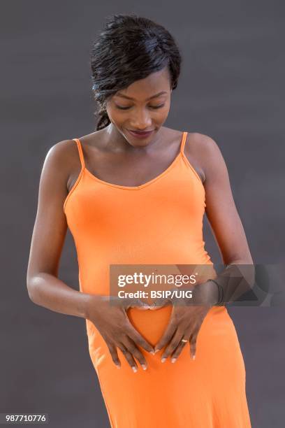 8 months pregnant woman. - bsip stock pictures, royalty-free photos & images