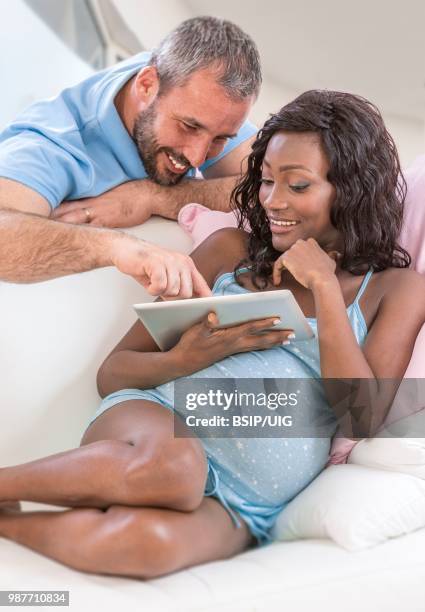 8 months pregnant woman. - bsip stockfoto's en -beelden