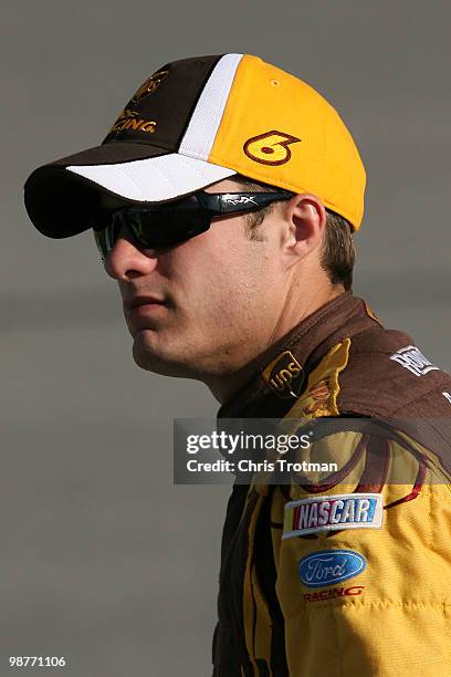 David Ragan, driver of the UPS Ford, looks on during qualifying for the NASCAR Sprint Cup Series Crown Royal Presents The Heath Calhoun 400 at...