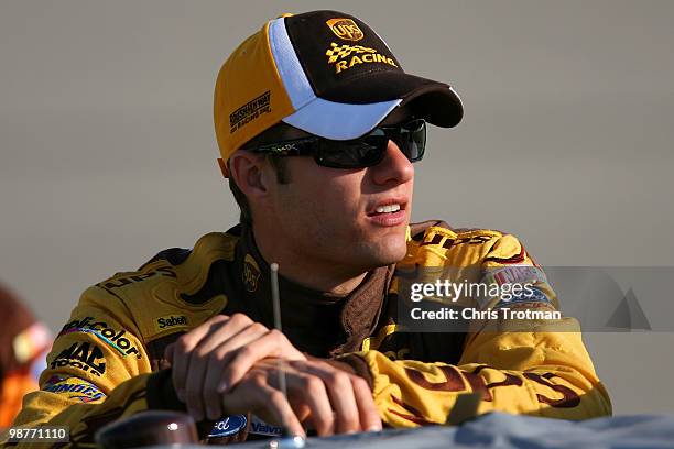 David Ragan, driver of the UPS Ford, looks on during qualifying for the NASCAR Sprint Cup Series Crown Royal Presents The Heath Calhoun 400 at...