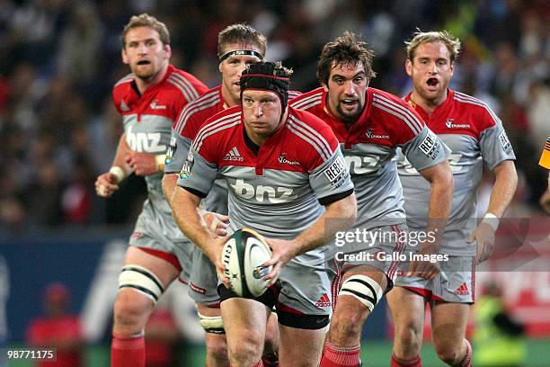 Crusaders forward Thomas Waldrom on the attack with Crusaders eighth-man Kieran Read, Crusaders lock Brad Thorn, Crusaders forward Sam Whitelockand...