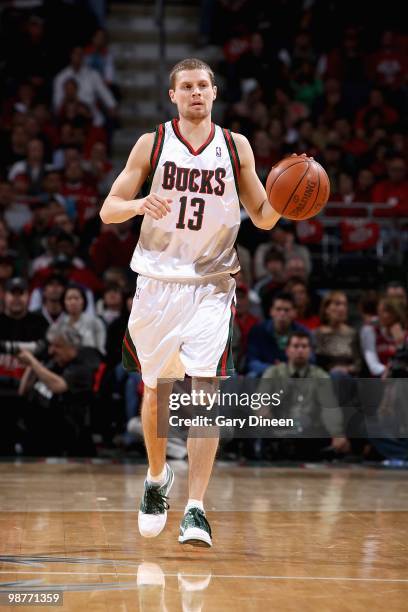 Luke Ridnour of the Milwaukee Bucks drives the ball up court in Game Three of the Eastern Conference Quarterfinals against the Atlanta Hawks of the...