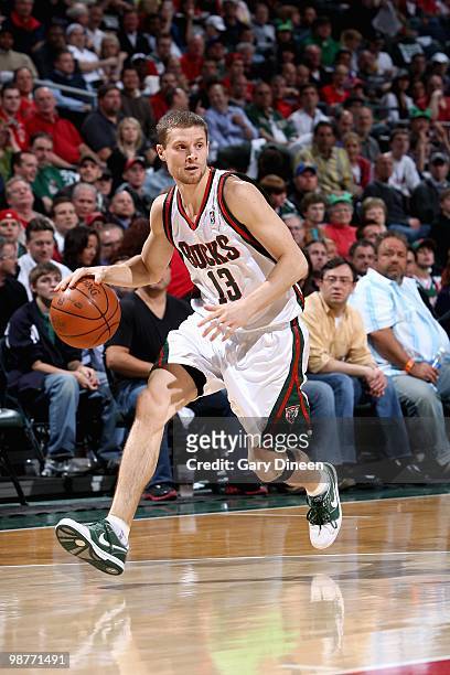 Luke Ridnour of the Milwaukee Bucks drives the ball up court against the Atlanta Hawks in Game Four of the Eastern Conference Quarterfinals of the...