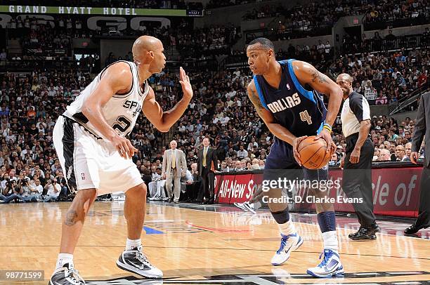 Caron Butler of the Dallas Mavericks handles the ball against Richard Jefferson of the San Antonio Spurs in Game Six of the Western Conference...