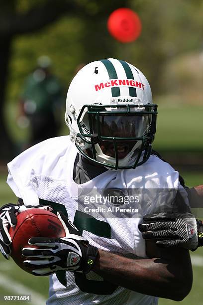 Running Back Joe McKnight of the New York Jets runs the ball at New York Jets rookie mini camp on April 30, 2010 in Florham Park, New Jersey.