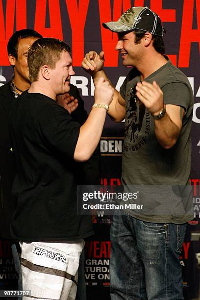 Boxers Ricky Hatton of Great Britain and Joe Calzaghe of Wales greet each other from the stage before the start of the Floyd Mayweather Jr. And Shane...