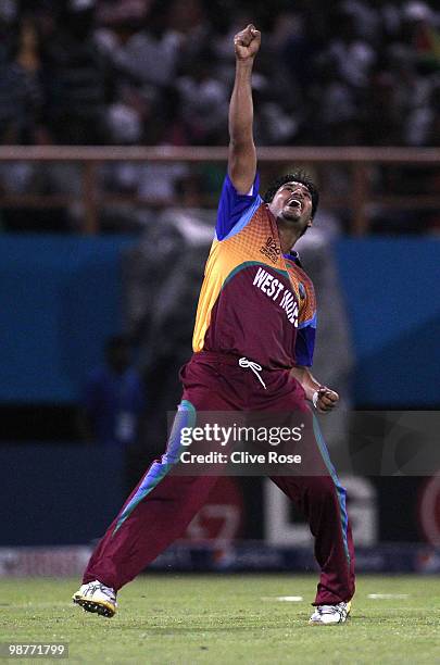 Ravi Rampaul of West Indies celebrates the wicket of Alex Cusack of Ireland during the ICC T20 World Cup Group D match between West Indies and...