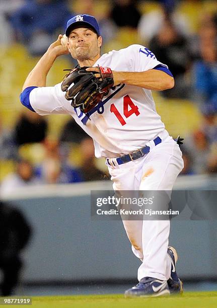 Short stop Jamey Carroll of the Los Angeles Dodgers throws to first base during the baseball game against the Pittsburgh Pirates on April 29, 2010 at...