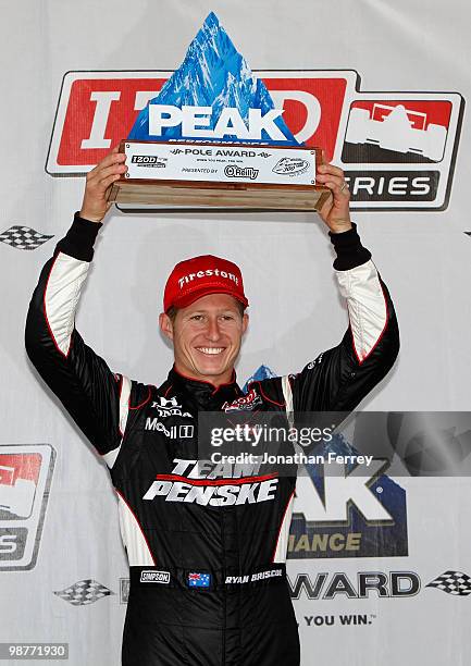 Ryan Briscoe driver of the Team Penske Honda Dallara celebrates winning the pole for the Indy Car Series Road Runner Turbo Indy 300 on April 30, 2010...