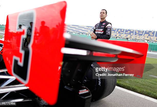 Helio Castroneves prepares to qualify his Team Penske Honda Dallara during practice for the Indy Car Series Road Runner Turbo Indy 300 on April 30,...