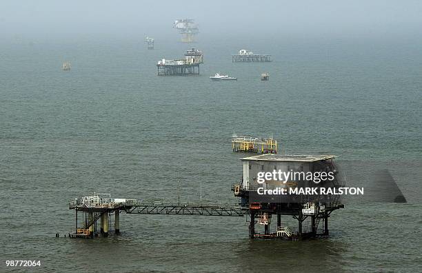 Oil platforms off the coast of Louisiana on April 30, 2010. A giant oil slick threatened economic and environmental devastation as it closed in on...