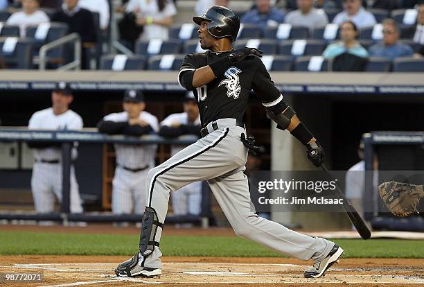 Alexei Ramirez of the Chicago White Sox follows through on a lead off base hit against the New York Yankees on April 30, 2010 at Yankee Stadium in...