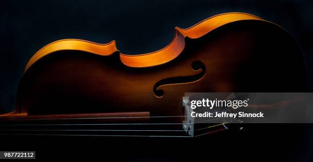 music of light - cello stock pictures, royalty-free photos & images