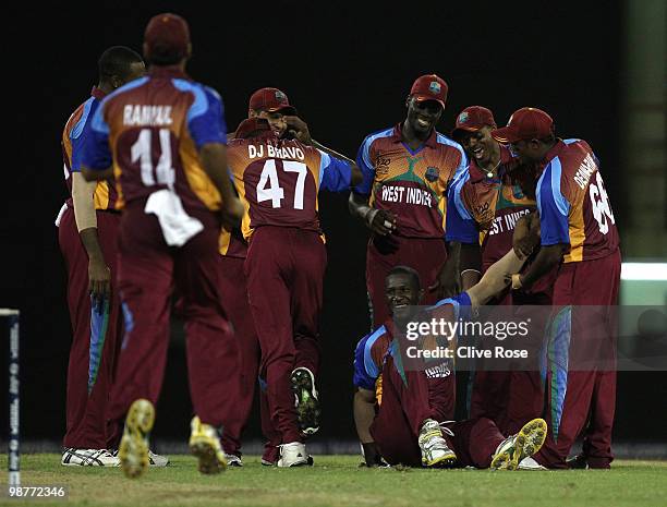 Darren Sammy of West Indies is congratulated on his match winning performance after taking the final wicket during the ICC T20 World Cup Group D...