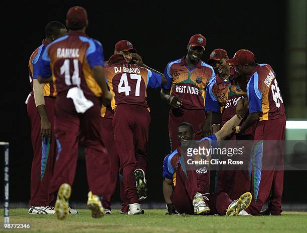 Darren Sammy of West Indies is congratulated on his match winning performance after taking the final wicket during the ICC T20 World Cup Group D...
