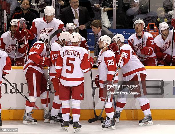 Head coach Mike Babcock of the Detroit Red Wings speaks to his team during a time out in their game against the San Jose Sharks in Game One of the...