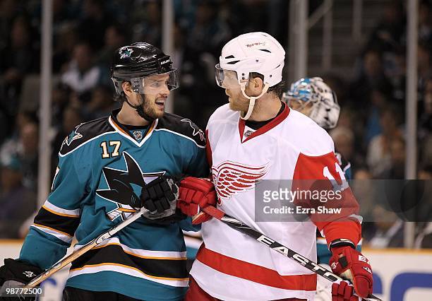 Torrey Mitchell of the San Jose Sharks has words with Dan Cleary of the Detroit Red Wings in Game One of the Western Conference Semifinals during the...