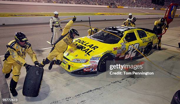 Reed Sorenson, driver of the Dollar General Toyota, makes a pit stop during the NASCAR Nationwide Series BUBBA burger 250 at Richmond International...