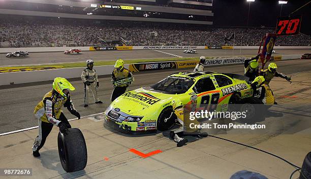Paul Menard, driver of the Richmond / Menards Ford, makes a pit stop during the NASCAR Nationwide Series BUBBA burger 250 at Richmond International...