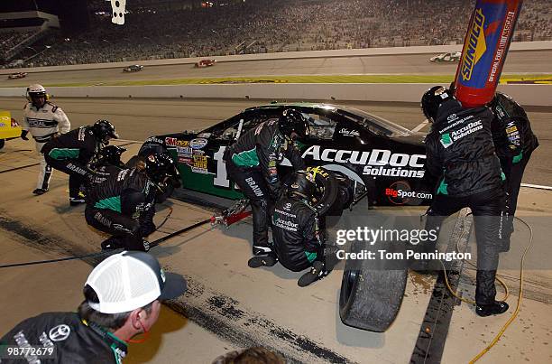 Brian Scott, driver of the AccuDoc Solutions Toyota, makes a pit stop during the NASCAR Nationwide Series BUBBA burger 250 at Richmond International...