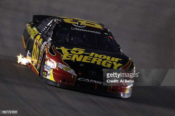Steve Wallace, driver of the 5-Hour Energy Toyota, races during the NASCAR Nationwide Series BUBBA burger 250 at Richmond International Raceway on...
