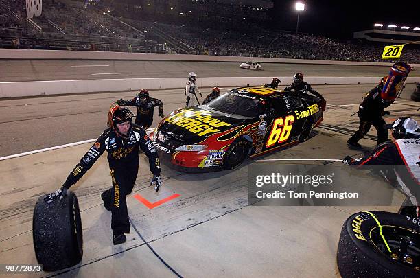 Steve Wallace, driver of 5-Hour Energy Toyota, makes a pit stop during the NASCAR Nationwide Series BUBBA burger 250 at Richmond International...