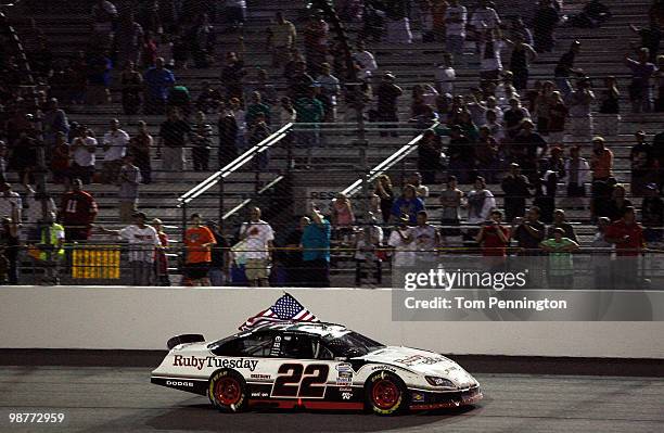 Brad Keselowski, driver of the Ruby Tuesday Dodge, celebrates after winning the NASCAR Nationwide Series BUBBA burger 250 at Richmond International...