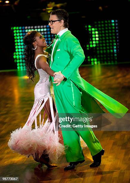 Casting director Rolf Schneider and professional dancer Motsi Mabuse dance during the 'Let's Dance' TV show at Studios Adlershof on April 30, 2010 in...