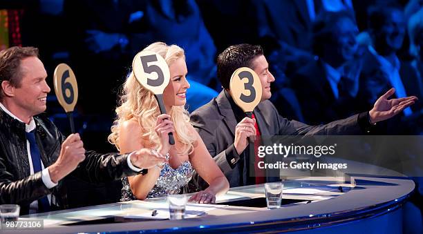 Jury members Peter Kraus, Isabel Edvardsson and Joachim Llambi judge during the 'Let's Dance' TV show at Studios Adlershof on April 30, 2010 in...