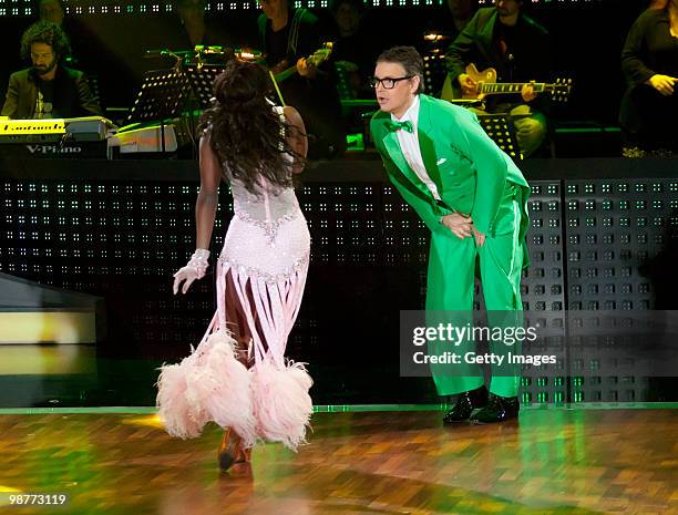 Casting director Rolf Schneider and professional dancer Motsi Mabuse dance during the 'Let's Dance' TV show at Studios Adlershof on April 30, 2010 in...