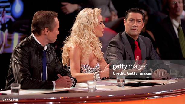 Jury members Peter Kraus, Isabel Edvardsson and Joachim Llambi talk during the 'Let's Dance' TV show at Studios Adlershof on April 30, 2010 in...