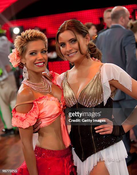 Dutch TV host Sylvie van der Vaart and German actress Sophia Thomalla pose after the 'Let's Dance' TV show at Studios Adlershof on April 30, 2010 in...