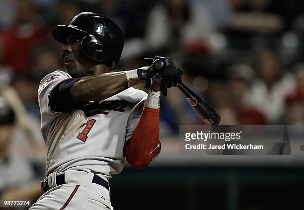 Orlando Hudson of the Minnesota Twins hits a single during the game against the Cleveland Indians on April 30, 2010 at Progressive Field in...