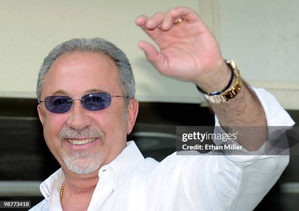 Producer and musician Emilio Estefan Jr. Waves outside the Flamingo Las Vegas during the Las Vegas Walk of Stars unveiling ceremony for him and his...