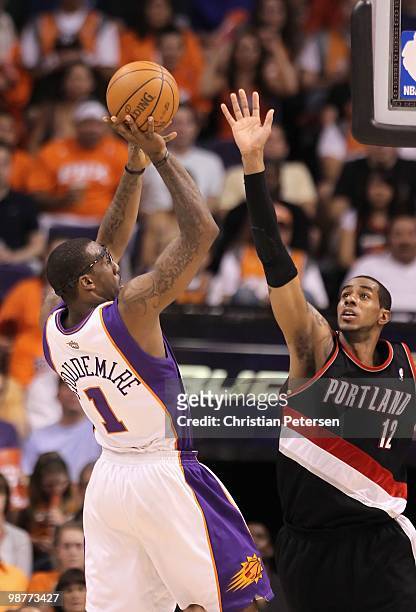 Amar'e Stoudemire of the Phoenix Suns puts up a shot over LaMarcus Aldridge of the Portland Trail Blazers during Game Five of the Western Conference...