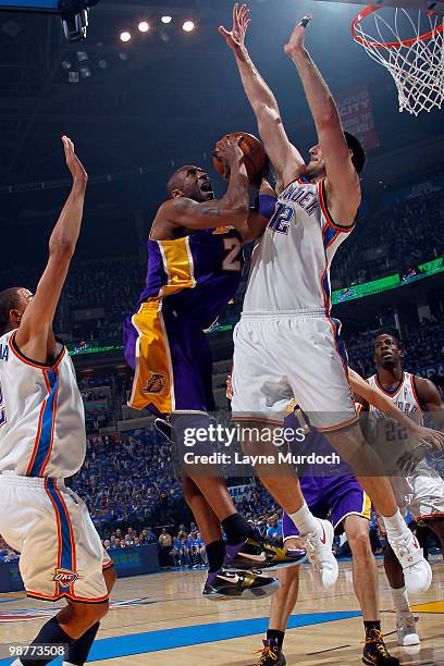 Kobe Bryant of the Los Angeles Lakers goes to the basket against Nenad Krstic of the Oklahoma City Thunder in Game Six of the Western Conference...