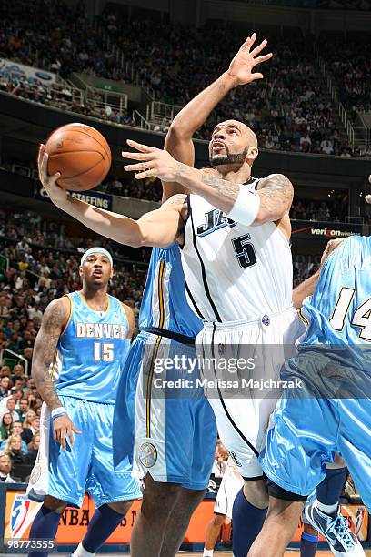 Carlos Boozer of the Utah Jazz goes up for the shot against the Denver Nuggets in Game Six of the Western Conference Quarterfinals during the 2010...