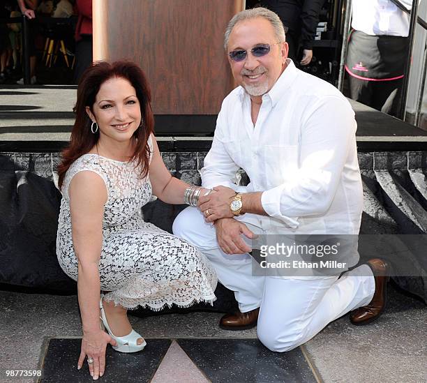 Singer Gloria Estefan and her husband, producer and musician Emilio Estefan Jr., pose outside the Flamingo Las Vegas during the Las Vegas Walk of...
